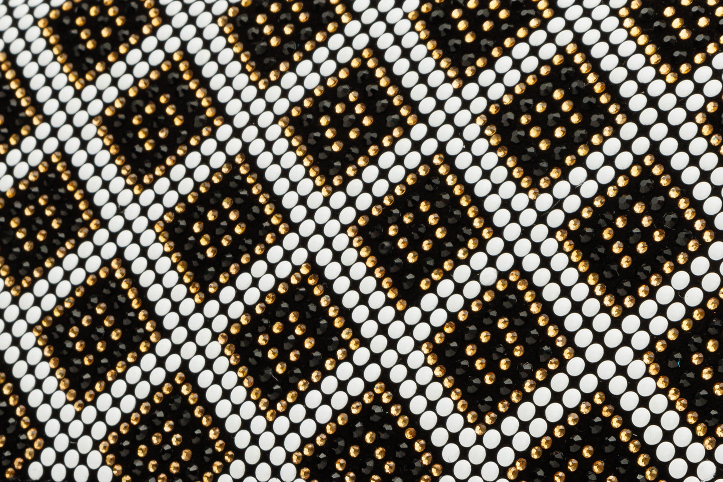 El clutch Nampula de piel de ante con purpurina negra