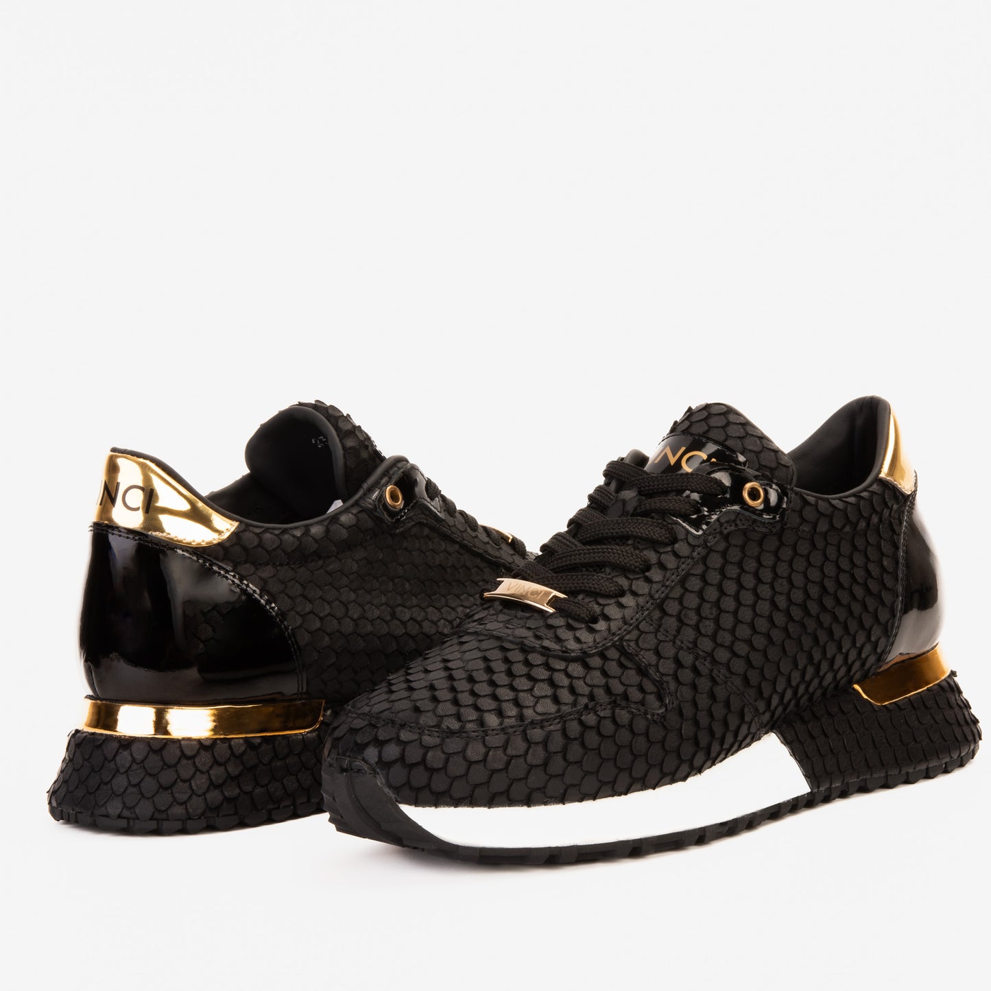 Zapatillas de deporte Majesty de piel negra y dorada para hombre