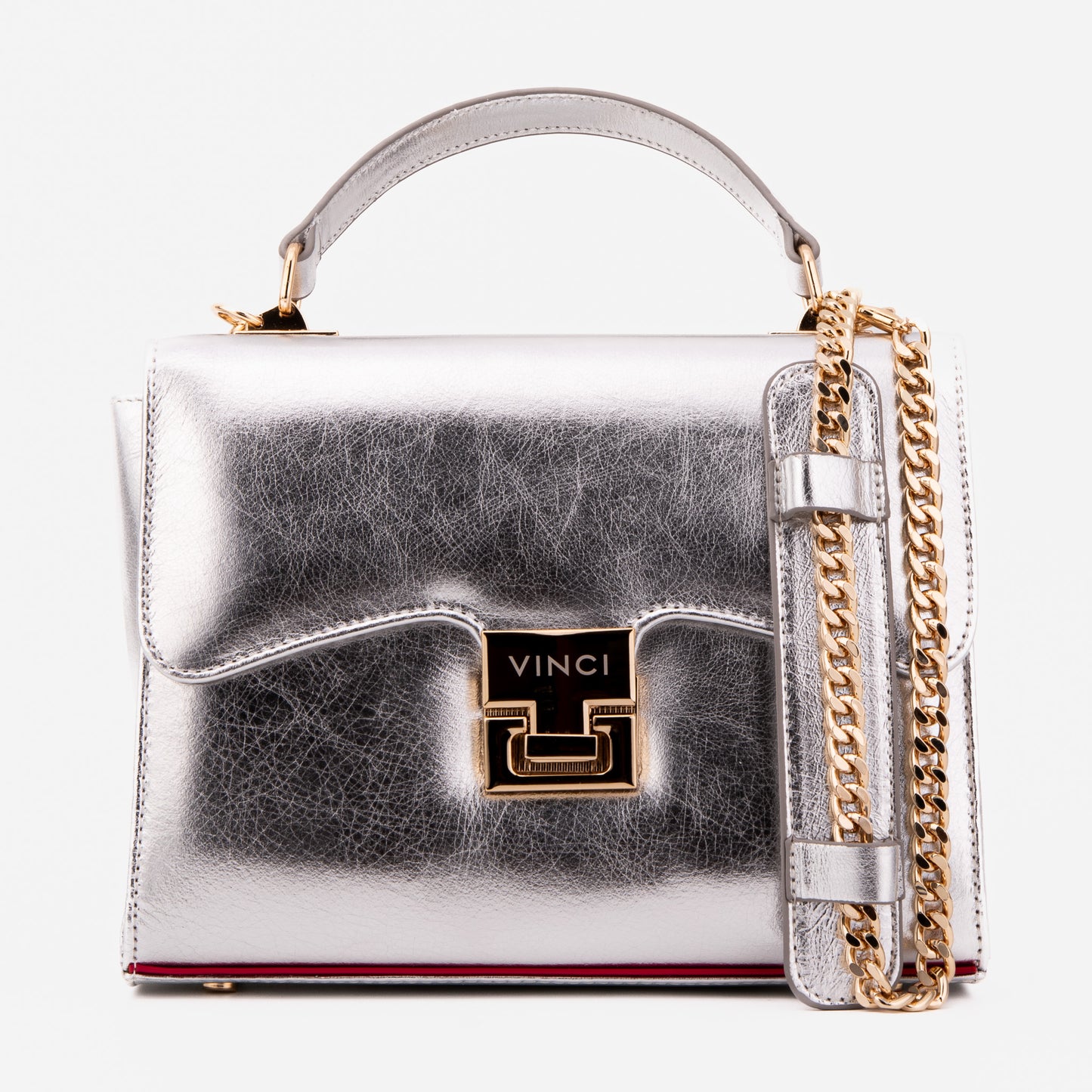 El bolso de mano de piel plateada Ege