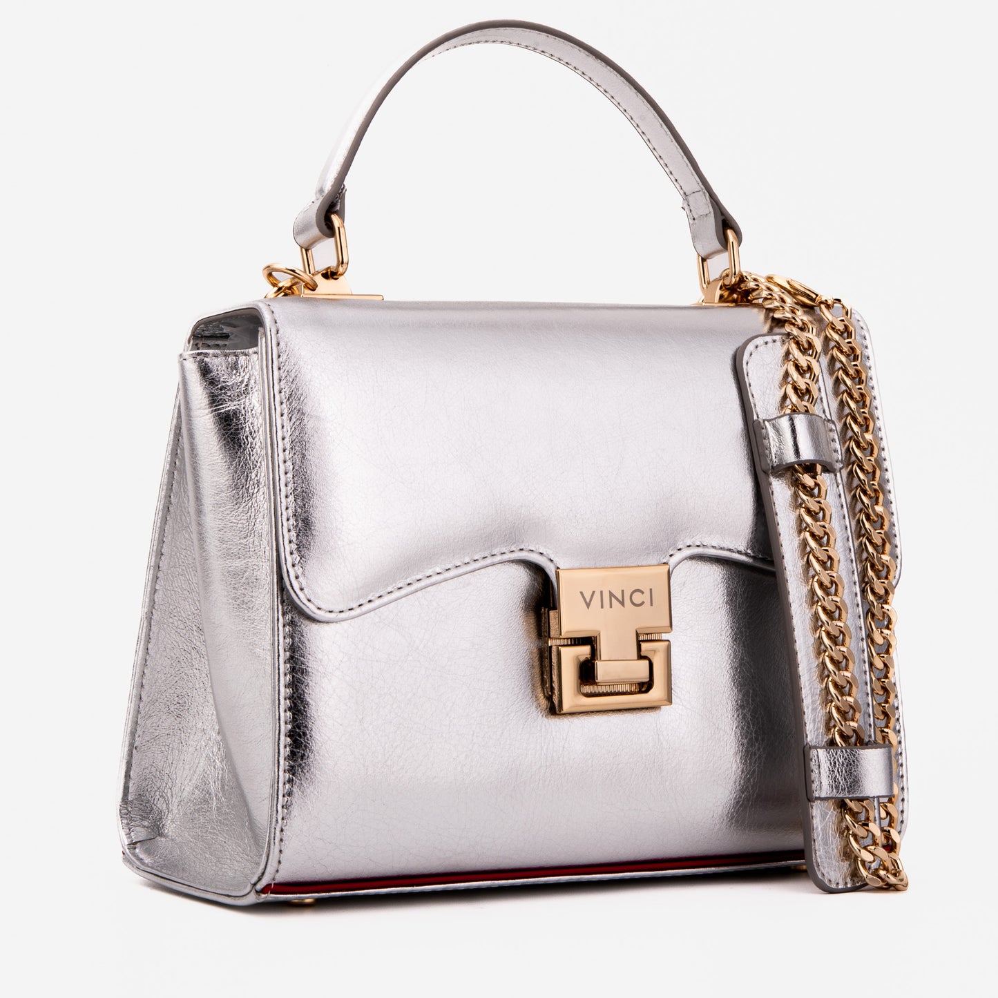 El bolso de mano de piel plateada Ege