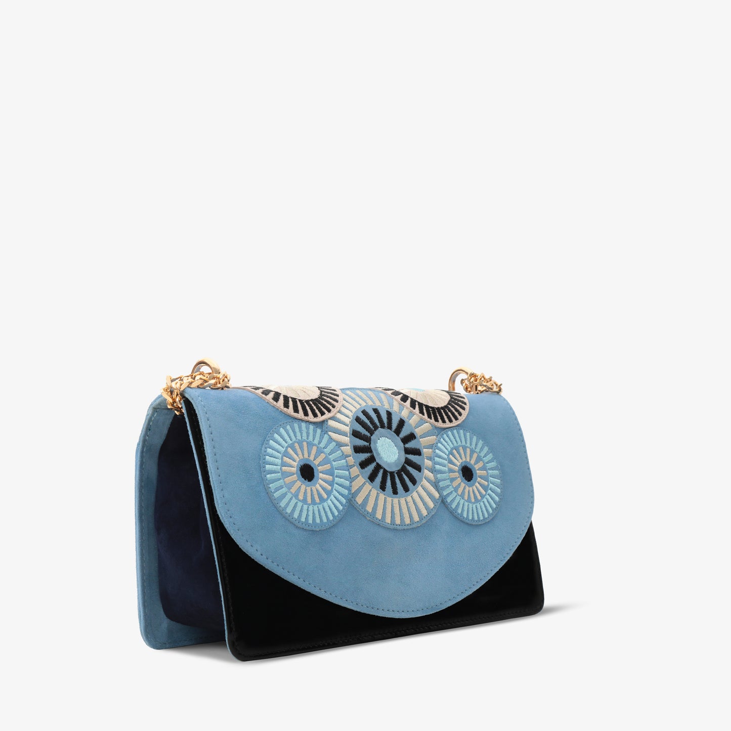 El bolso de mano de piel de ante azul Parama