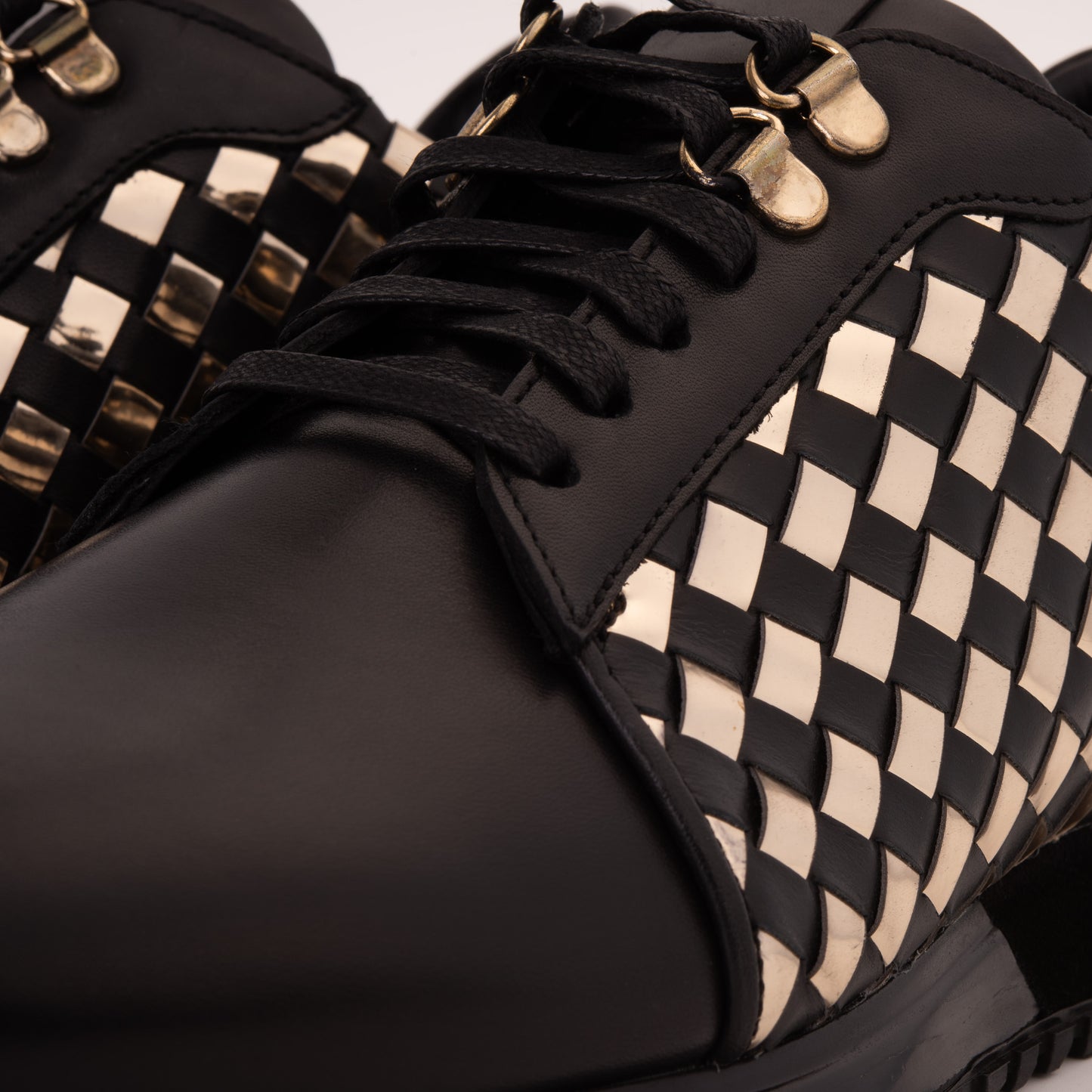 The Mackenzie Black & Gold Woven Leather Men Sneaker