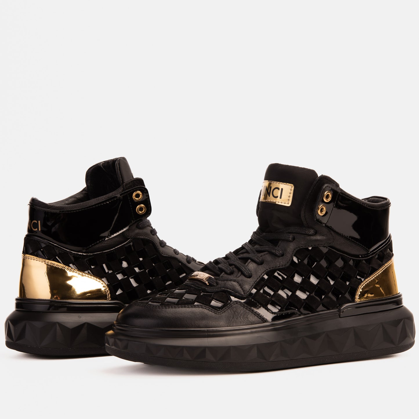 Zapatillas altas de cuero tejido en negro y dorado Eugene para hombre