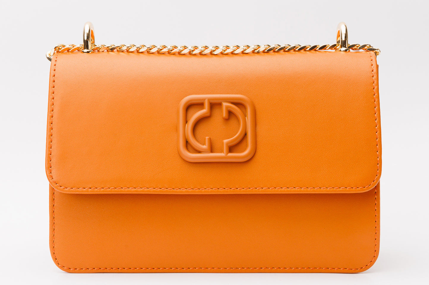 El bolso de mano de piel naranja Maneadero