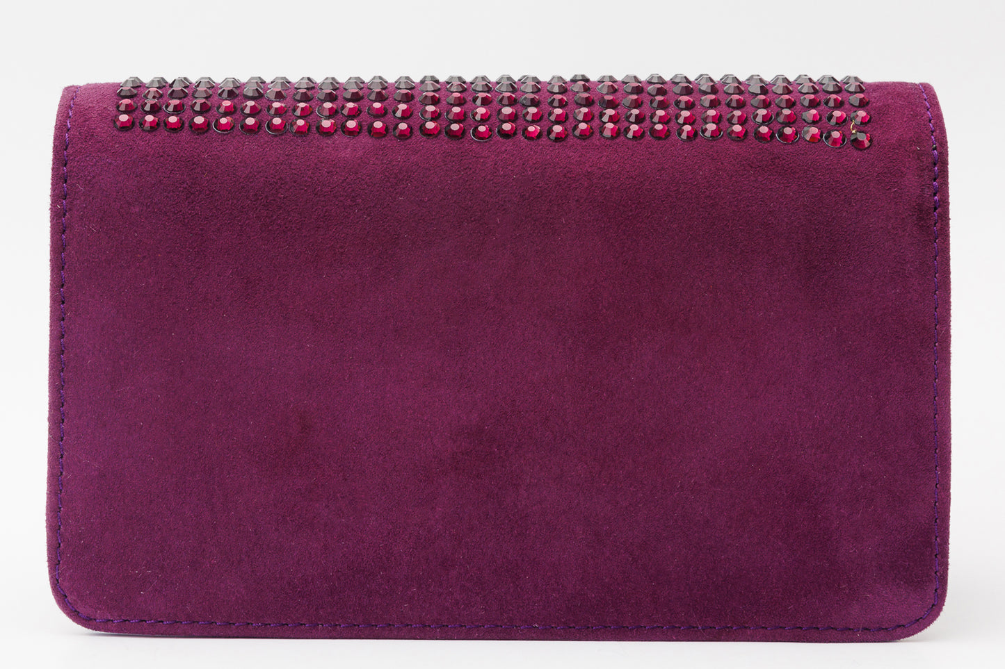 El bolso de mano de piel morada de Ailano
