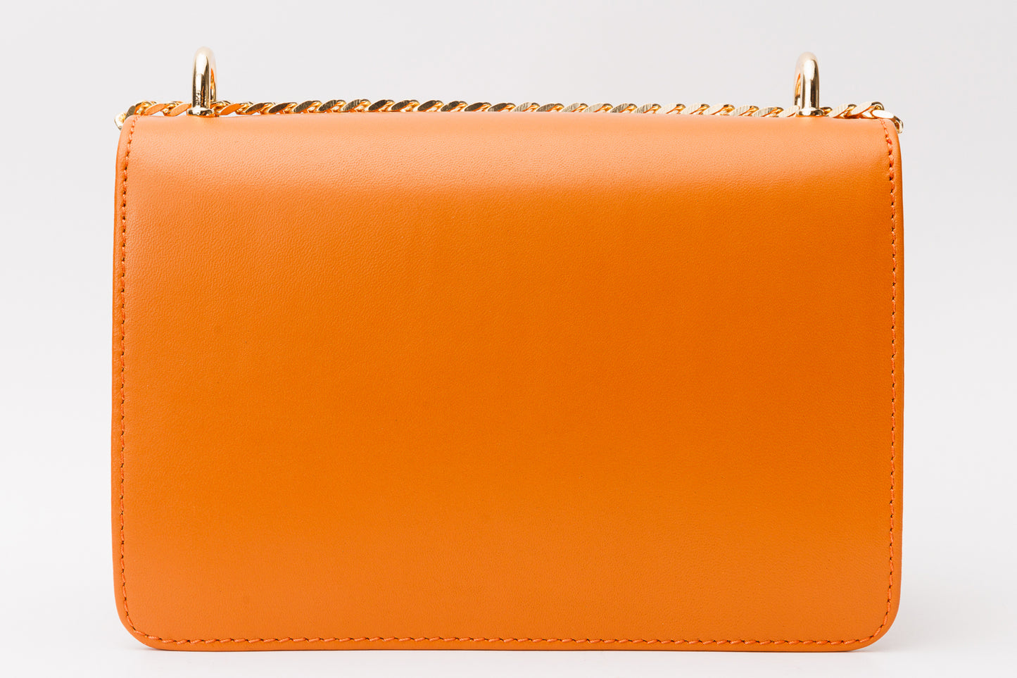El bolso de mano de piel naranja Maneadero