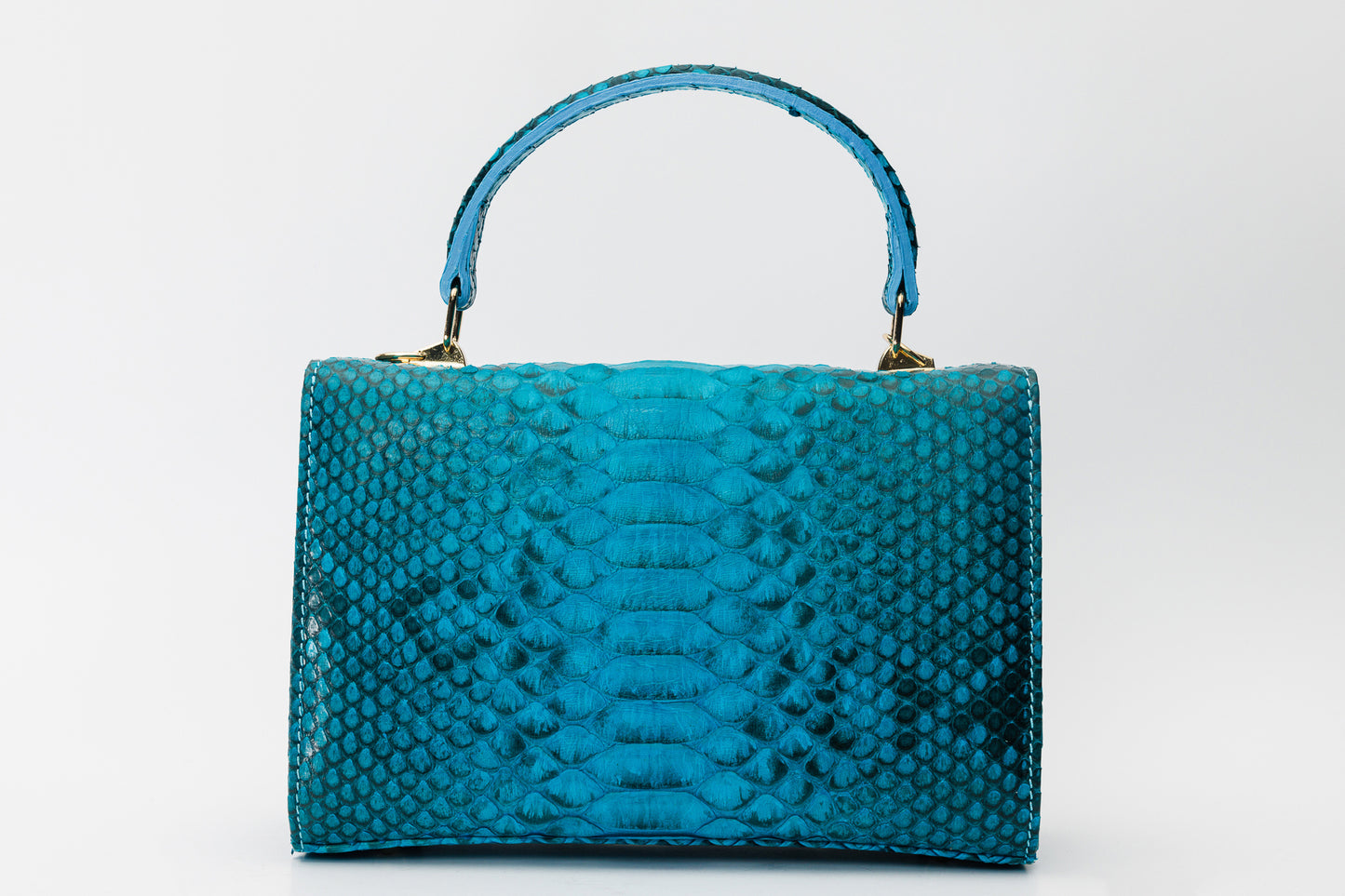 Bolso de mano de piel color turquesa The Queen