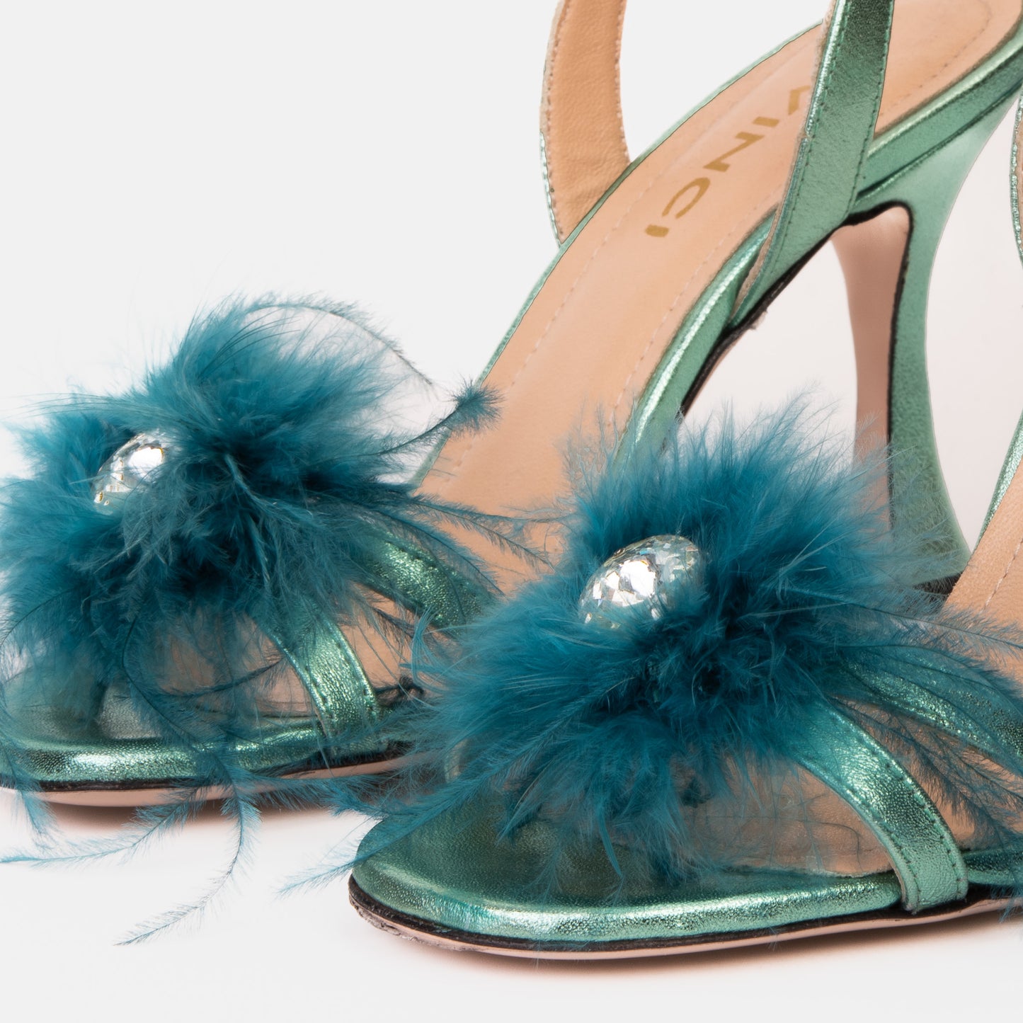 The Siena Turquoise Leather Ankle Strap Plumed Women Sandal