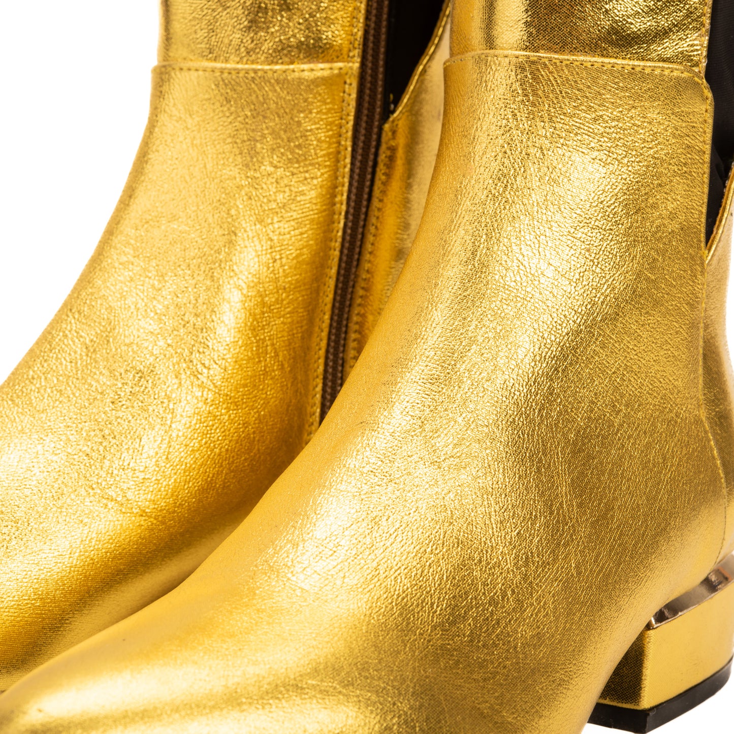 Las botas de mujer Fairoks de cuero dorado con punta afilada hasta la rodilla