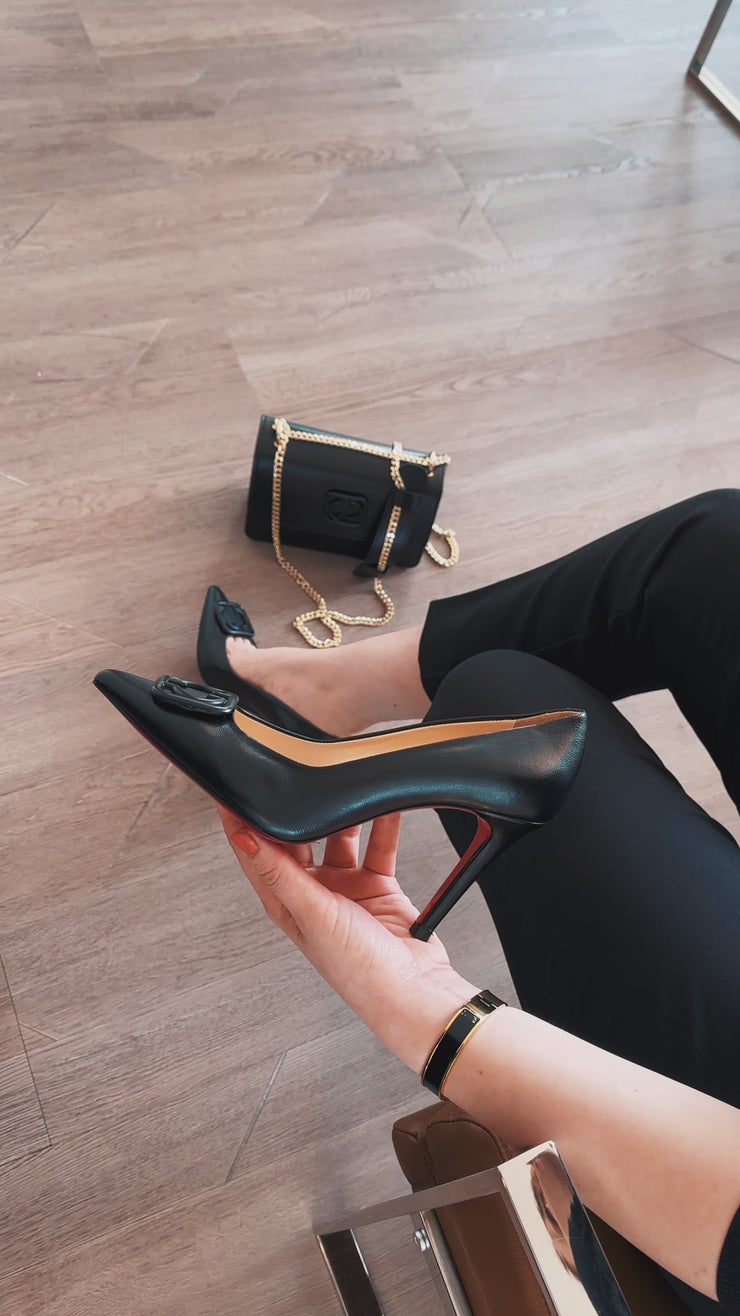 The Maneadero Black Leather Pump Fuchsia Sole