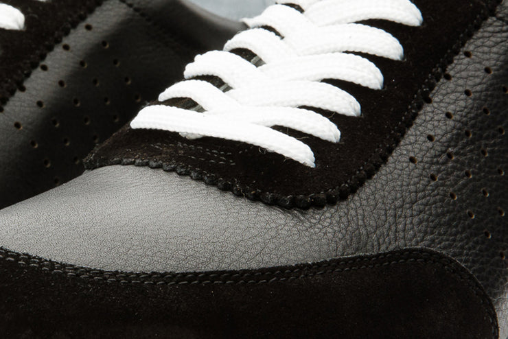 The Rotello Black Leather Sneaker