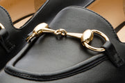 The Delhi Black Leather Block Heel Pump
