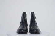 The Rand Black Leather Double Buckle Brogue Boot with a Zipper