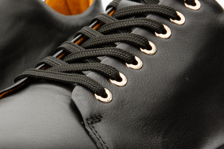 The Peklin Black Leather Sneaker