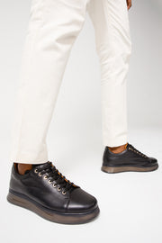 The Peklin Black Leather Sneaker