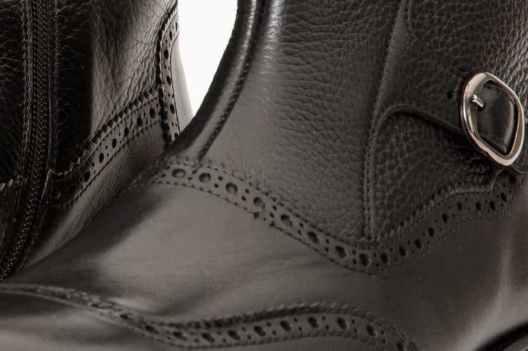 The Rand Black Leather Double Buckle Brogue Boot with a Zipper