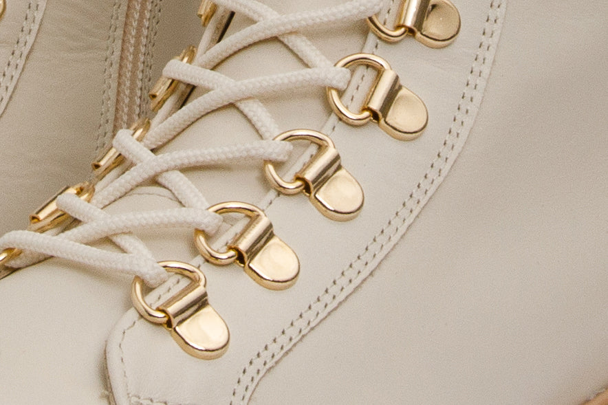 Bota hasta la rodilla con cordones de cuero color crema Istinye para mujer, edición limitada