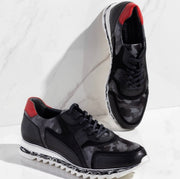 The Cakarta Black Leather Sneaker
