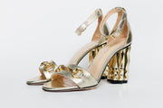 The Avlonya Block Heel Gold Leather Ankle Strap Sandal